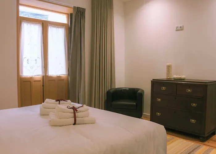 Siglas & Runas Повуа-ди-Варзин